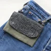 waist pouch made with black and white dot lid, and khaki fabric.